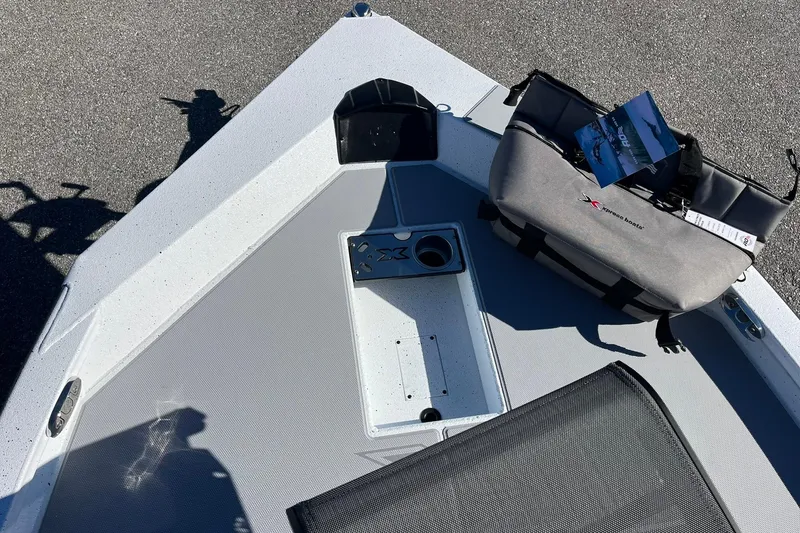 Slide: The Image of 2026 Express H18C Crappie boat deck with Yamaha Vmax 115 SHO accessories. - 12