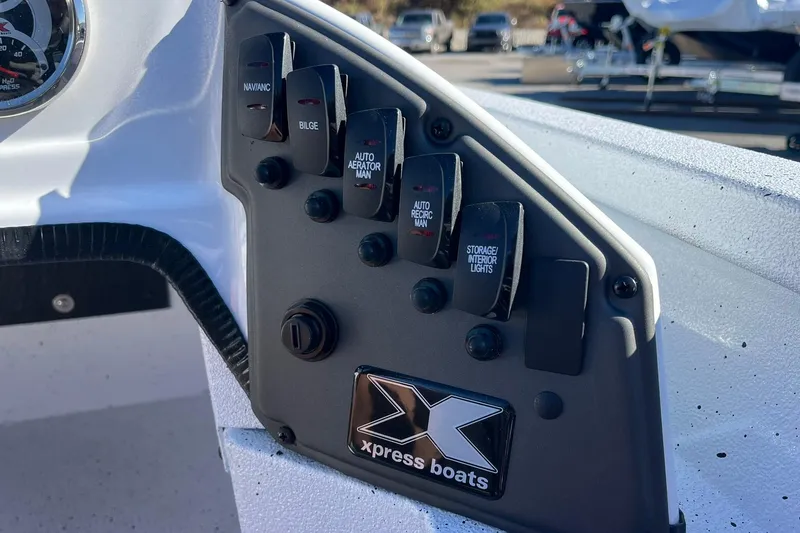 Slide: The Image of Control panel of 2026 Express H18C Crappie boat with Yamaha Vmax 115 SHO engine. - 17
