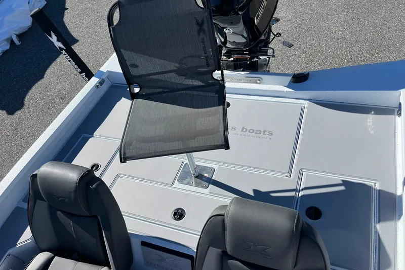 Slide: The Image of 2026 Express H18C Crappie boat interior with Yamaha Vmax 115 SHO engine. - 19