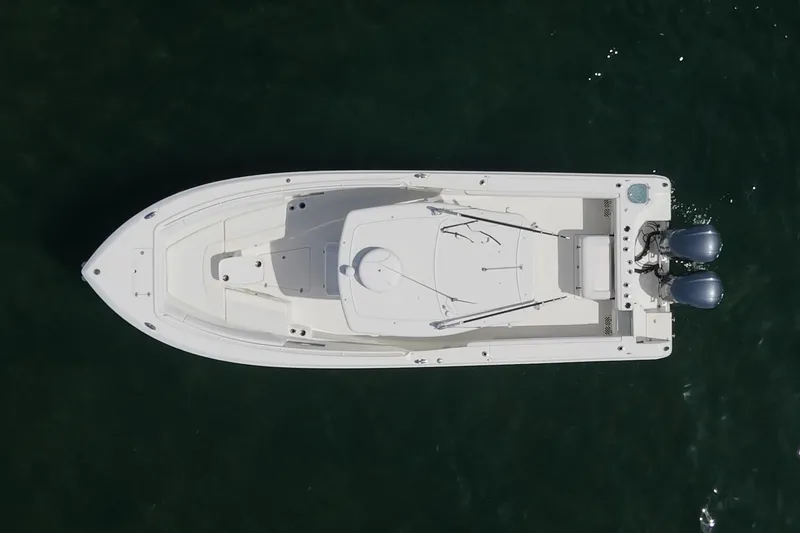 Slide: The Image of Overhead view of 2015 Sailfish 320 CC boat on water. - 1