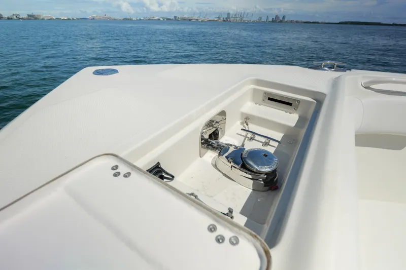 Slide: The Image of 2015 Sailfish 320 CC boat anchor compartment with ocean view. - 9