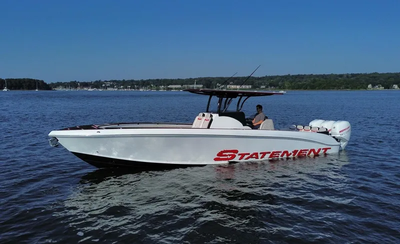 The Image of 2017 Statement 380 Open boat on calm water, side view. - 0