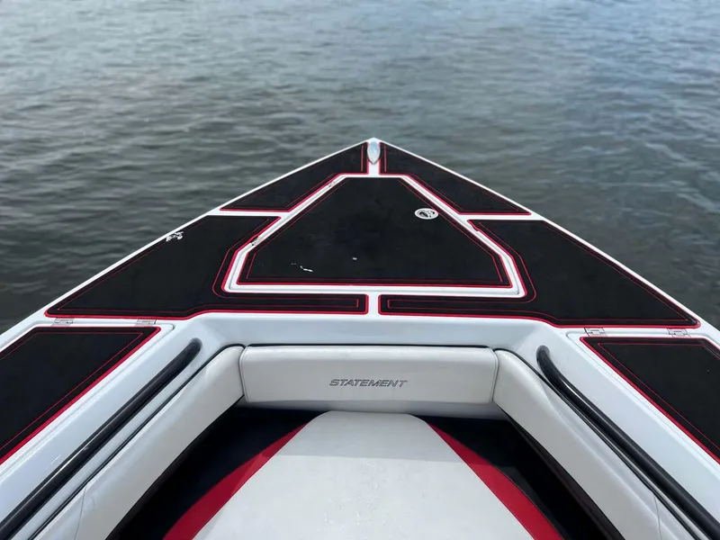 Slide: The Image of Bow of 2017 Statement 380 Open boat on calm water. - 8