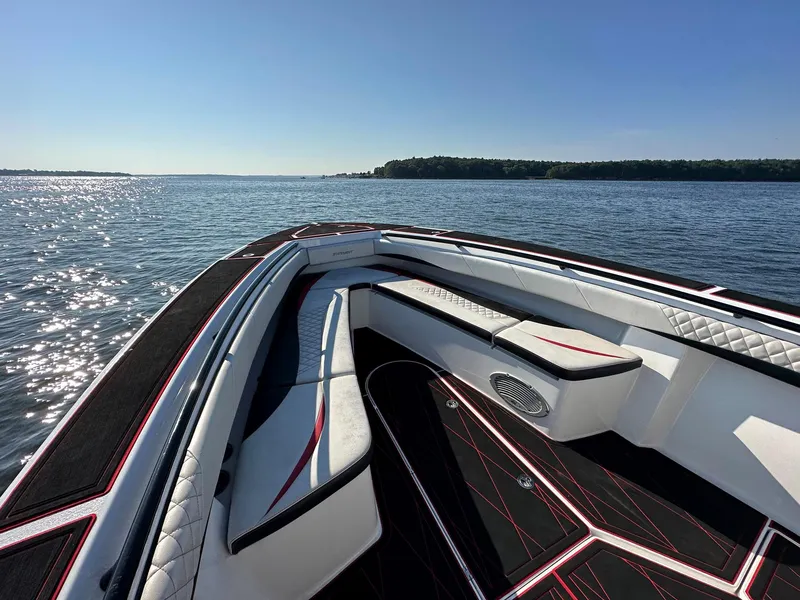 Slide: The Image of Luxurious 2017 Statement 380 Open boat interior on a serene lake. - 9