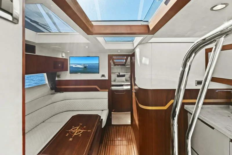 Slide: The Image of Interior of 2017 Galeon 385 HTS yacht with elegant wood finish and modern design. - 24