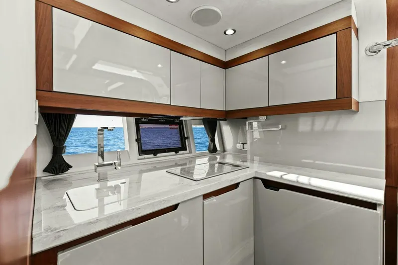 Slide: The Image of Luxurious kitchen interior of 2017 Galeon 385 HTS yacht with ocean view. - 30