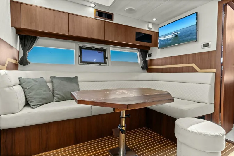 Slide: The Image of Luxurious interior of 2017 Galeon 385 HTS yacht with elegant seating and modern decor. - 34