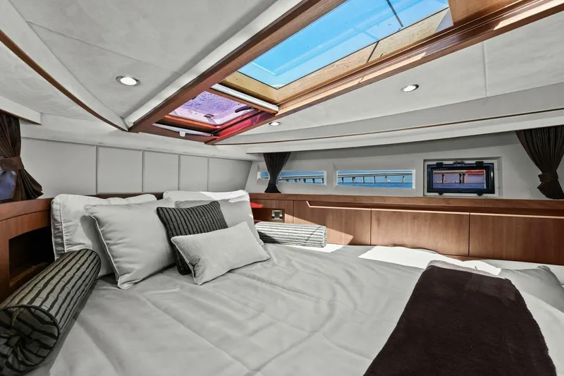 Slide: The Image of Luxurious interior of 2017 Galeon 385 HTS yacht with skylight and modern bedding. - 38