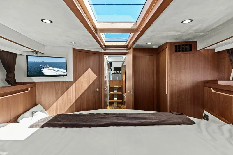 Slide: The Image of Luxurious interior of 2017 Galeon 385 HTS yacht with wood finish and skylight. - 39