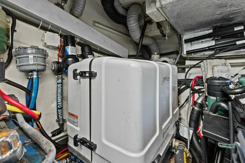 Slide: The Image of Engine room of 2017 Galeon 385 HTS yacht with various mechanical components. - 50