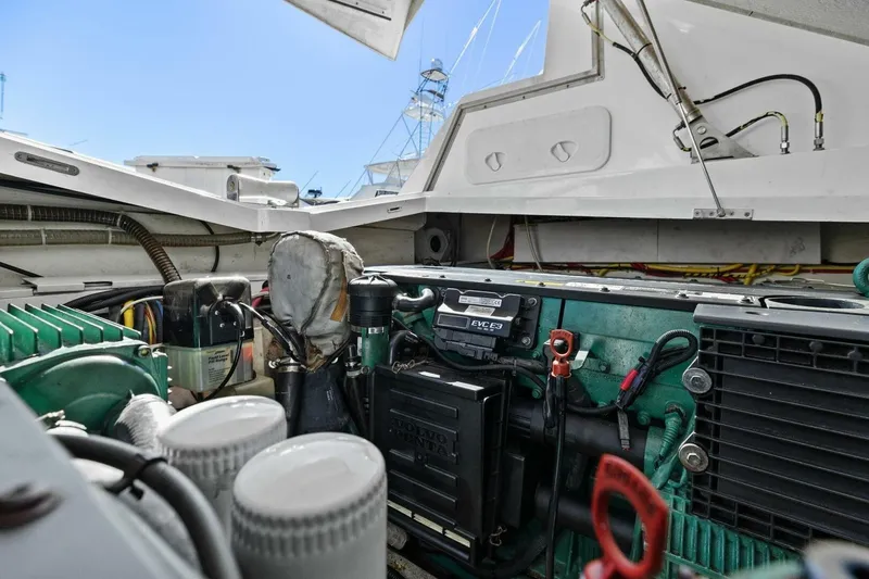 Slide: The Image of Engine compartment of 2017 Galeon 385 HTS yacht, showcasing mechanical components and wiring. - 51