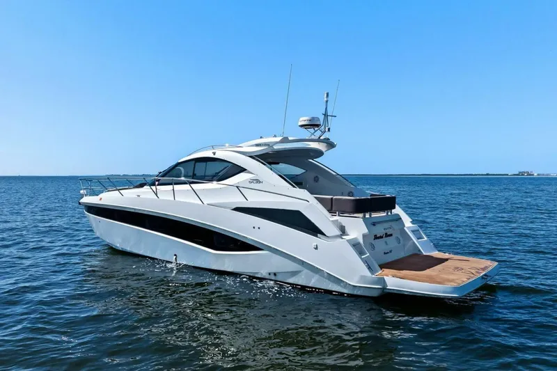 Slide: The Image of 2017 Galeon 385 HTS yacht on open water, rear view. - 6