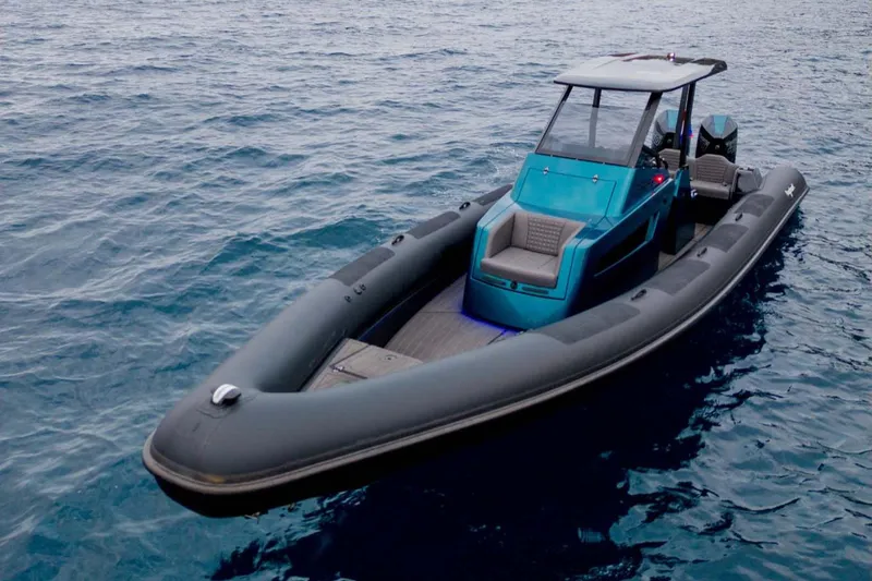 Slide: The Image of 2023 Roughneck 36 T Top boat on open water, featuring sleek design and modern amenities. - 1
