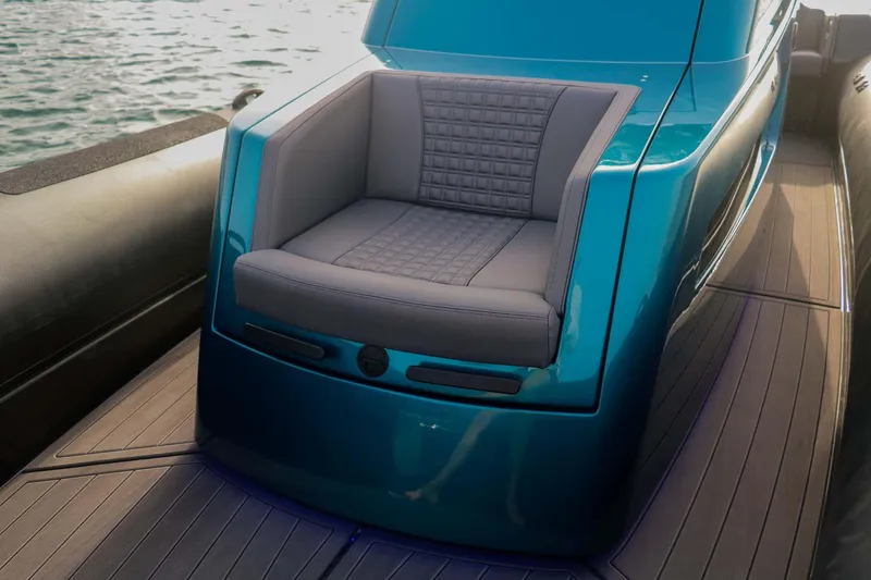 Slide: The Image of 2023 Roughneck 36 T Top boat with sleek seating and modern design on the water. - 24