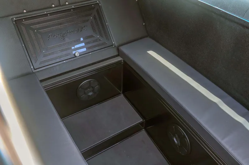 Slide: The Image of Interior seating of 2023 Roughneck 36 T Top boat with storage compartments. - 27