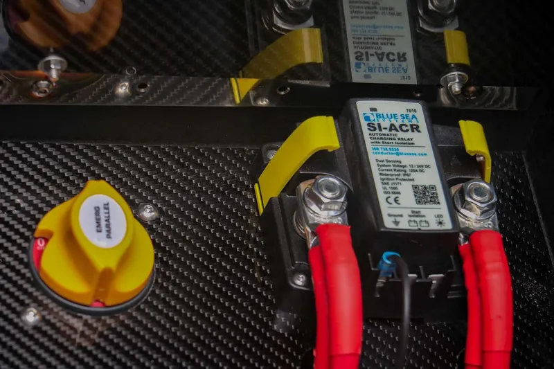 Slide: The Image of Electrical components in a 2023 Roughneck 36 T Top boat, featuring Blue Sea Systems SI-ACR. - 37