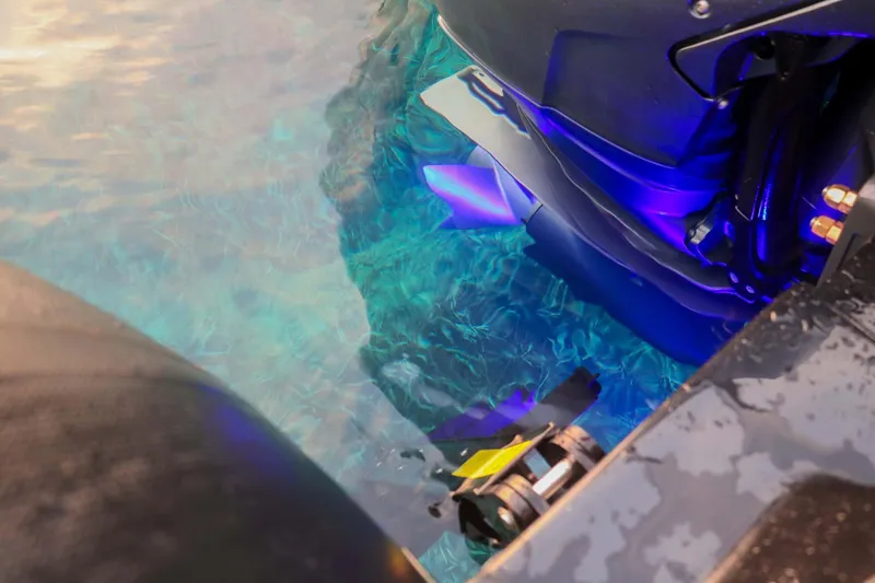 Slide: The Image of 2023 Roughneck 36 T Top boat engine in clear blue water. - 41