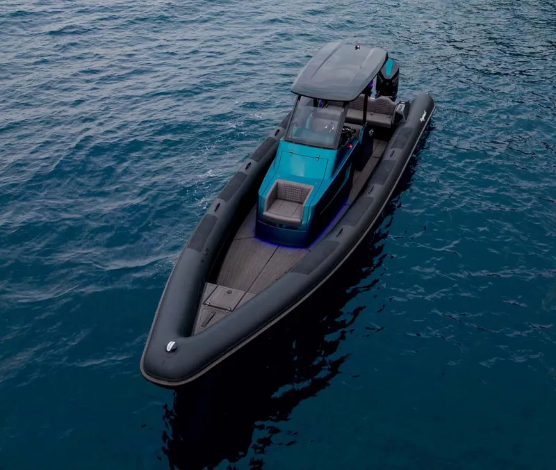 Slide: The Image of 2023 Roughneck 36 T Top boat on calm blue water. - 45