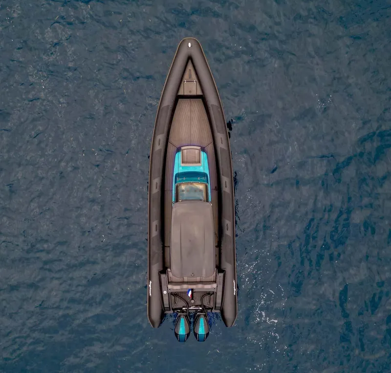 Slide: The Image of Aerial view of 2023 Roughneck 36 T Top boat on open water. - 46