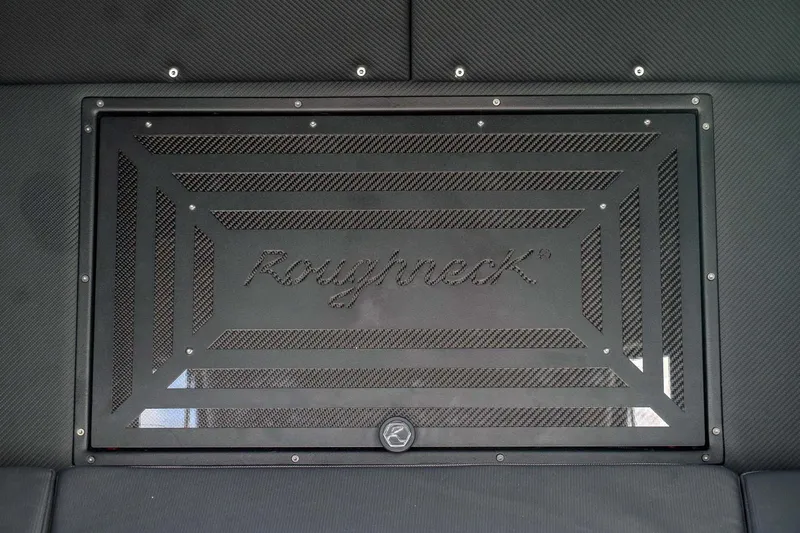 Slide: The Image of Roughneck 36 T Top 2023 boat interior with branded panel design. - 7