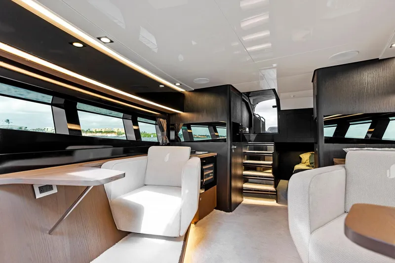 Slide: The Image of Luxurious interior of 2021 Sichterman Libertas 54 yacht with modern seating and sleek design. - 10
