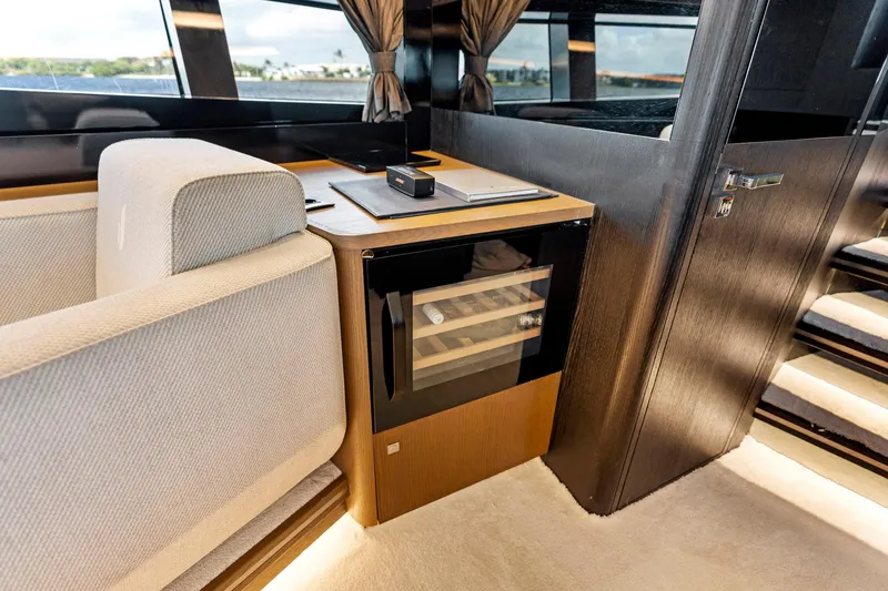 Slide: The Image of Luxurious interior of 2021 Sichterman Libertas 54 yacht with mini fridge and seating area. - 11