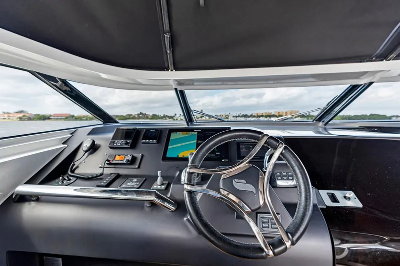 Slide: The Image of Sichterman Libertas 54 yacht helm, 2021 model, featuring modern navigation controls and sleek design. - 23