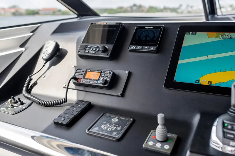Slide: The Image of Control panel of 2021 Sichterman Libertas 54 yacht with navigation and communication equipment. - 24