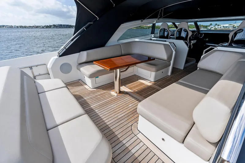 Slide: The Image of Luxurious 2021 Sichterman Libertas 54 yacht interior with elegant seating and wooden table. - 35