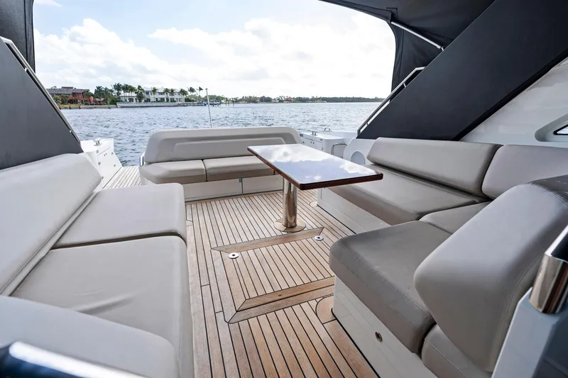 Slide: The Image of Luxurious 2021 Sichterman Libertas 54 yacht interior with elegant seating and wooden deck. - 37
