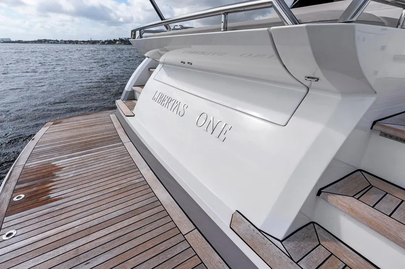 Slide: The Image of Sichterman Libertas 54 yacht, 2021 model, with wooden deck and sleek design. - 40