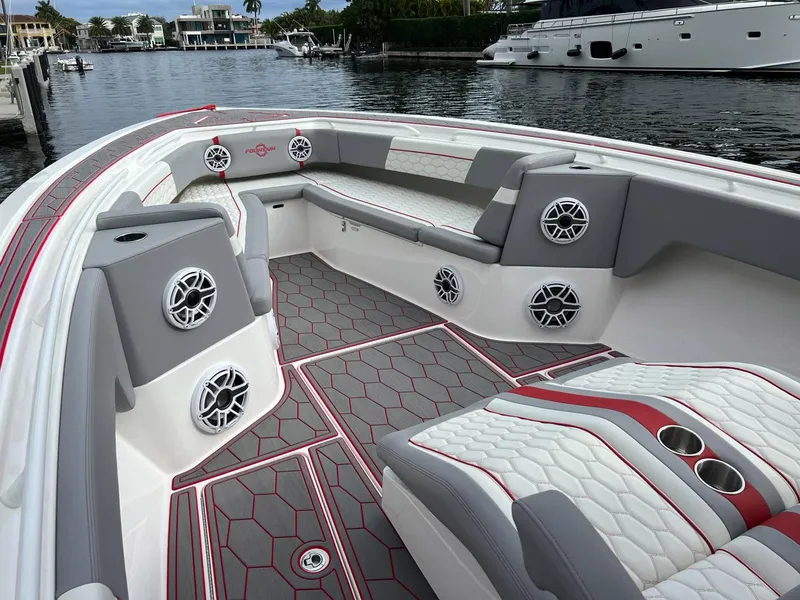 Slide: The Image of 2023 Fountain 38 SC boat interior with stylish seating and modern design. - 14