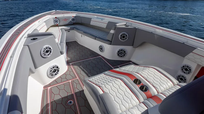 Slide: The Image of 2023 Fountain 38 SC boat interior with modern seating and speaker system. - 15