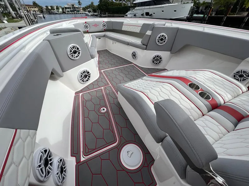 Slide: The Image of 2023 Fountain 38 SC boat interior with stylish seating and modern design. - 19