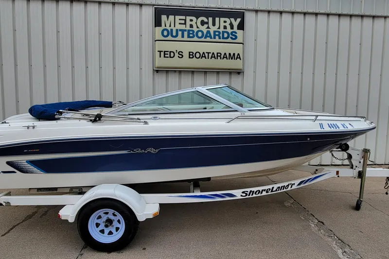 The Image of 1994 Sea Ray 180 Bow Rider boat on trailer at Ted's Boatarama dealership. - 0