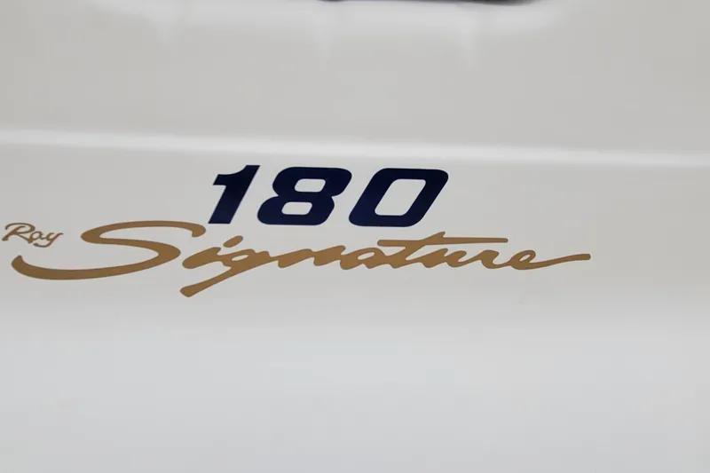 Slide: The Image of 1994 Sea Ray 180 Bow Rider Signature logo on boat hull. - 20