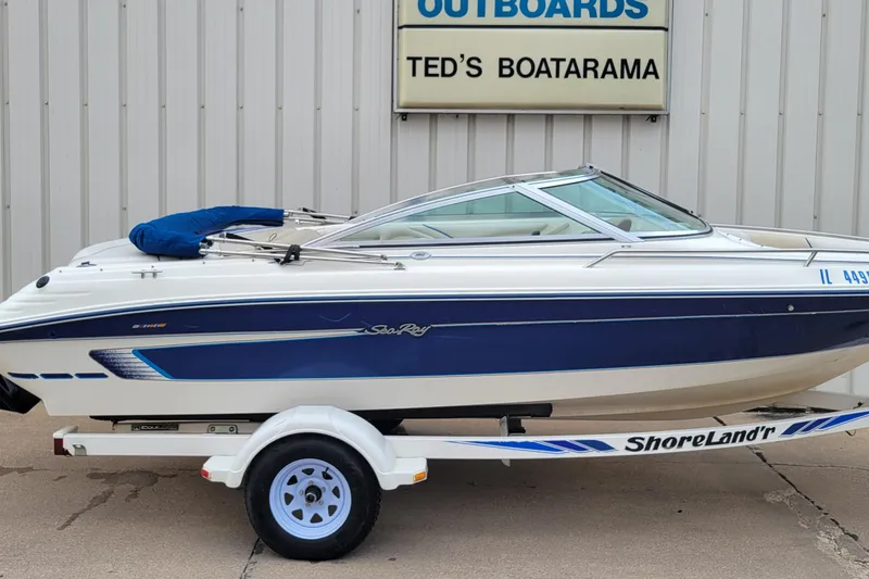 Slide: The Image of 1994 Sea Ray 180 Bow Rider boat on trailer at Ted's Boatarama. - 4