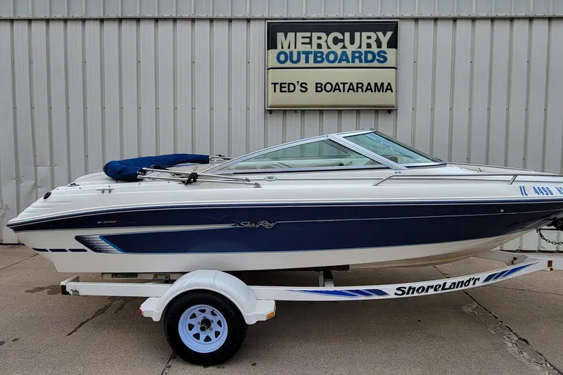 Slide: The Image of 1994 Sea Ray 180 Bow Rider boat on trailer at Ted's Boatarama dealership. - 6