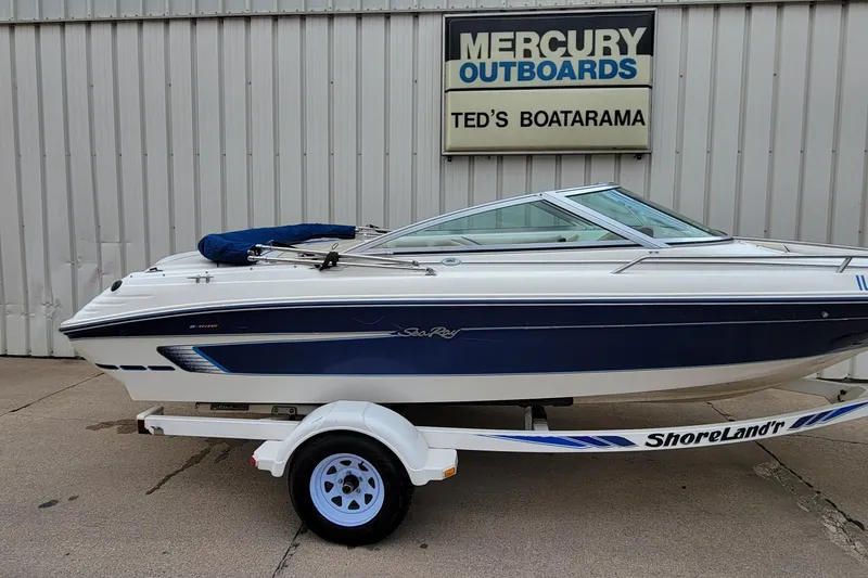 Slide: The Image of 1994 Sea Ray 180 Bow Rider boat on trailer at Ted's Boatarama. - 7