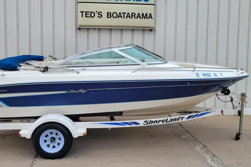 Slide: The Image of 1994 Sea Ray 180 Bow Rider boat on trailer at Ted's Boatarama. - 9