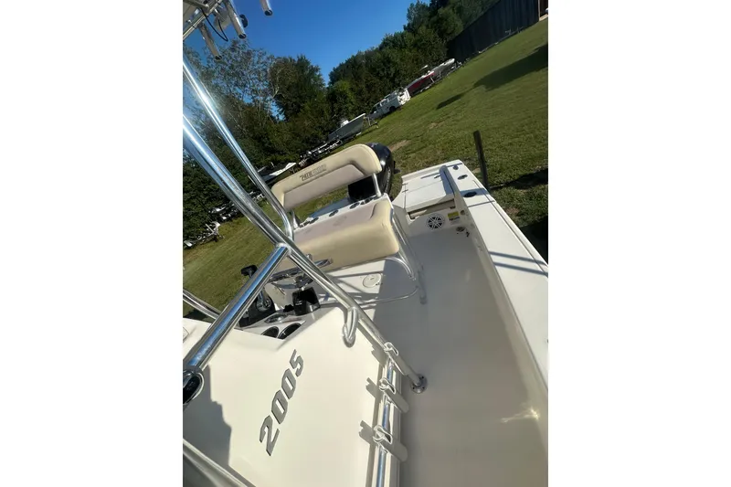 Slide: The Image of Pathfinder 2005 TRS boat interior with seating and chrome details, 2023 model. - 13