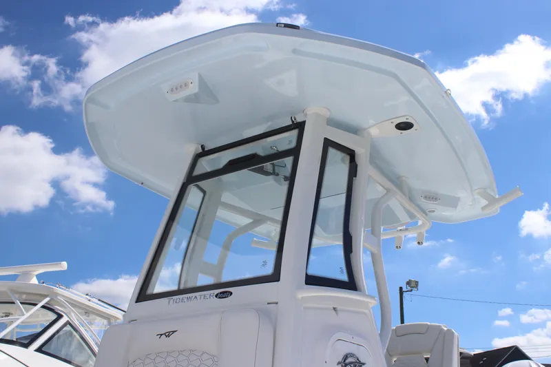 Slide: The Image of 2026 Tidewater 2700 Carolina Bay boat against a bright blue sky. - 3
