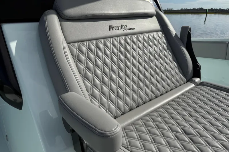 Slide: The Image of Luxurious seating on 2025 Front Runner 37 Catamaran with diamond-stitched upholstery. - 32