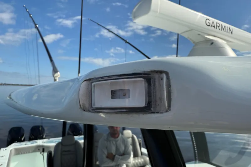 Slide: The Image of 2025 Front Runner 37 Catamaran with Garmin equipment on a sunny day. - 33