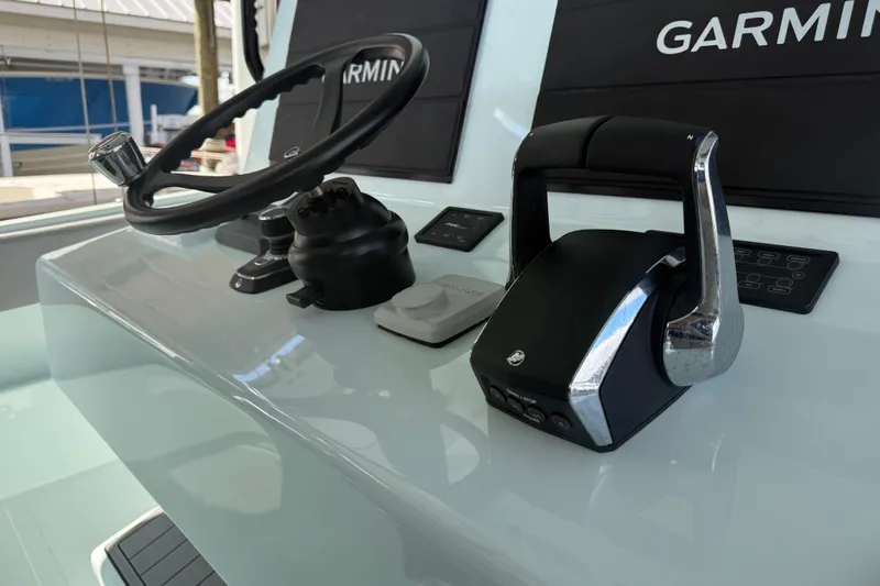 Slide: The Image of Control panel of 2025 Front Runner 37 Catamaran with Garmin navigation system. - 44