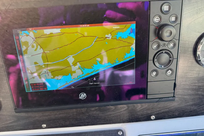 Slide: The Image of Navigation screen on 2020 Rinker 320 EX boat displaying a coastal map. - 13