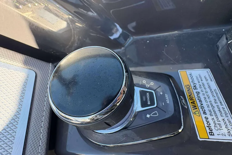 Slide: The Image of Control panel of a 2020 Monterey 305SS Super Sport boat with warning label. - 13