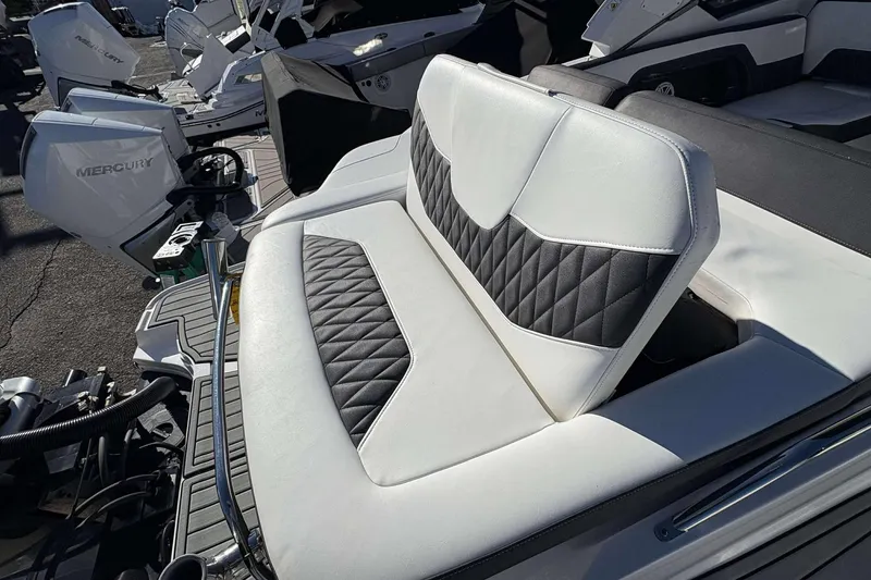 Slide: The Image of 2020 Monterey 305SS Super Sport boat with white and black quilted seating. - 24