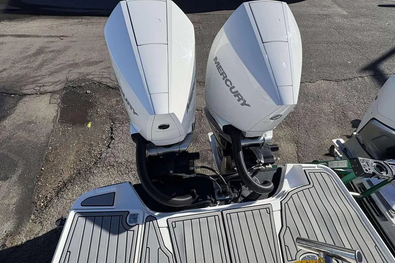 Slide: The Image of Twin Mercury outboard engines on a 2020 Monterey 305SS Super Sport boat. - 27