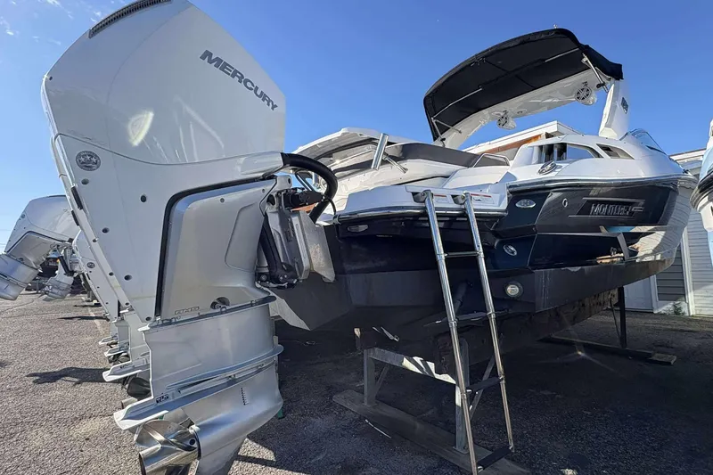 Slide: The Image of 2020 Monterey 305SS Super Sport boat with Mercury outboard engines, docked and ready. - 29
